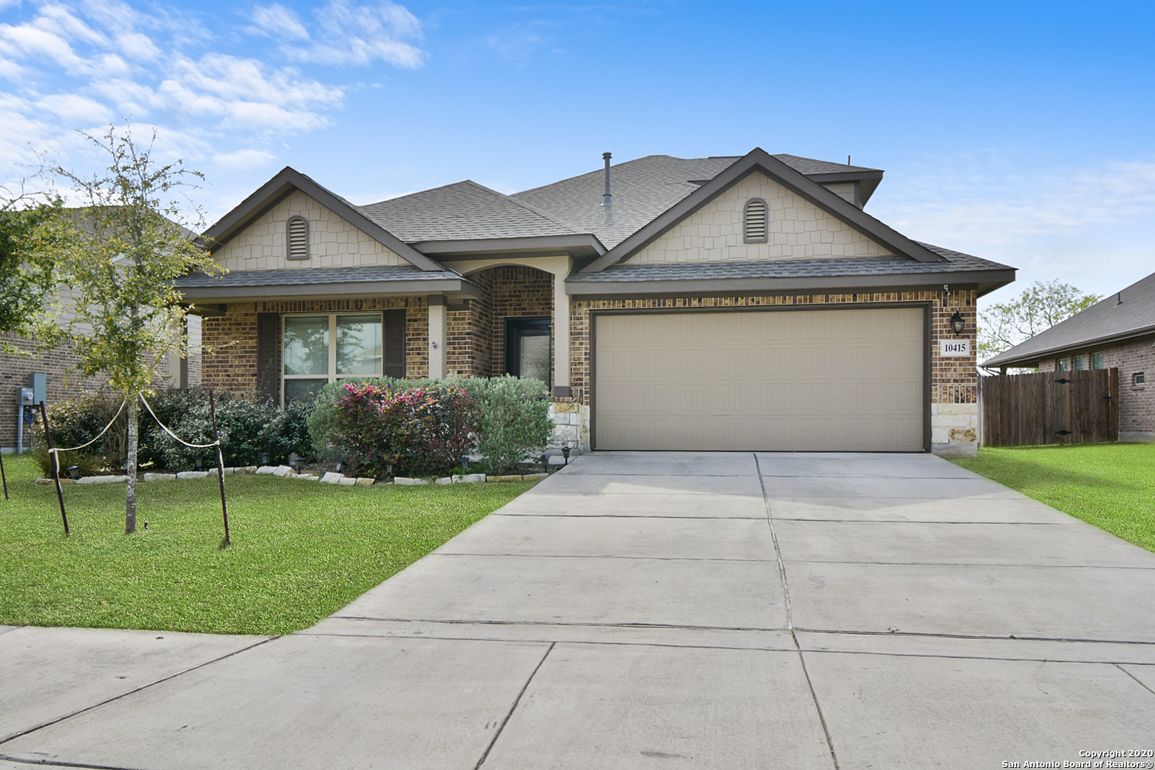 a view of outdoor space yard and garage