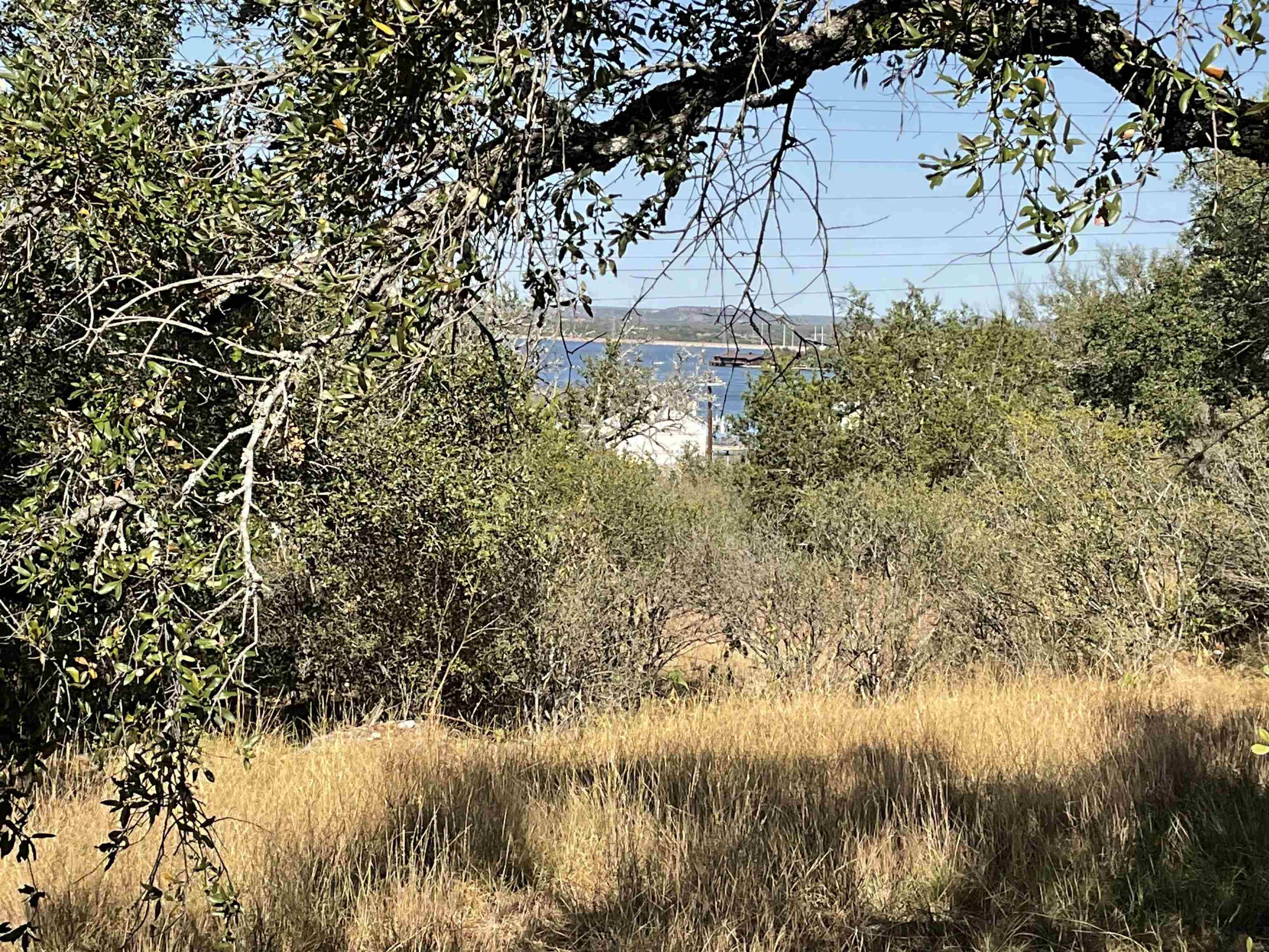 a view of lake with green space