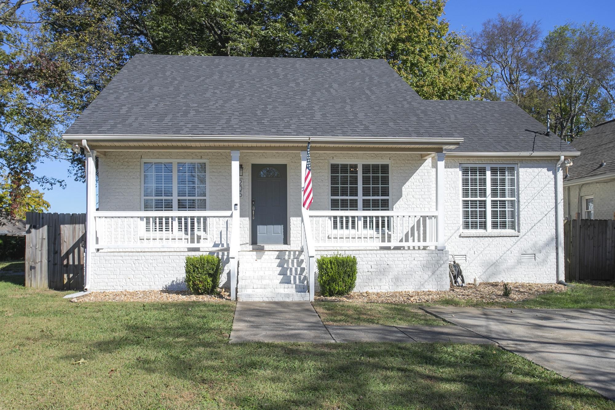 front view of a house with a yard