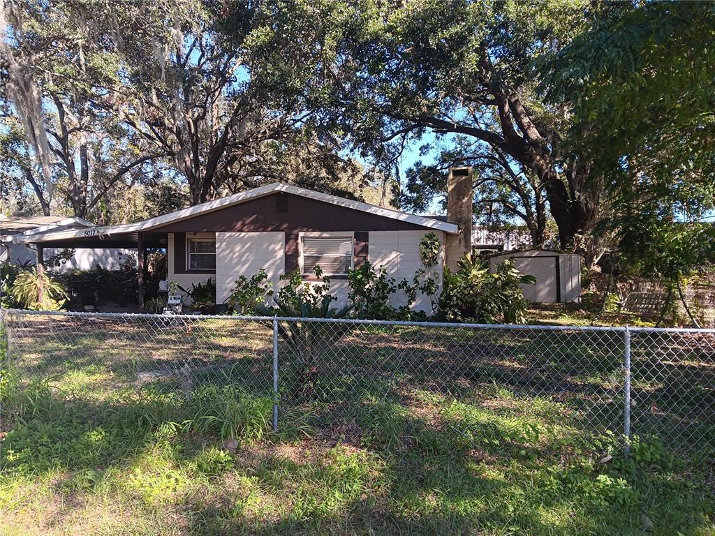 a view of a yard in front of house