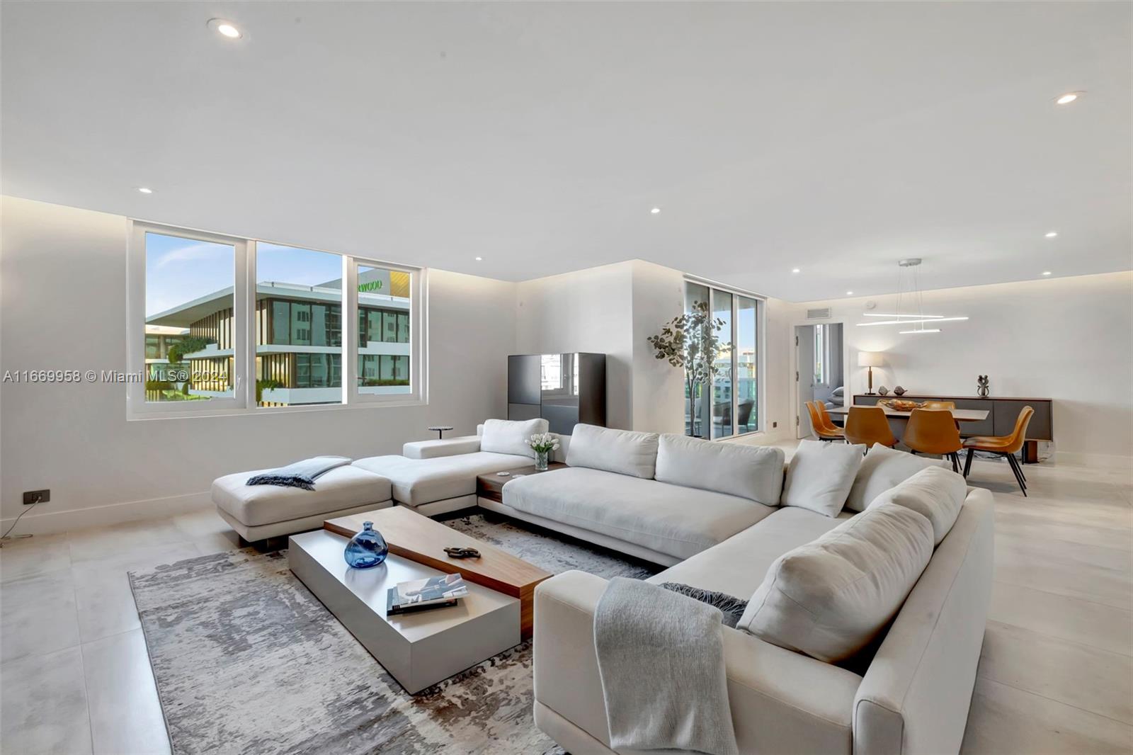 a living room with furniture and a table