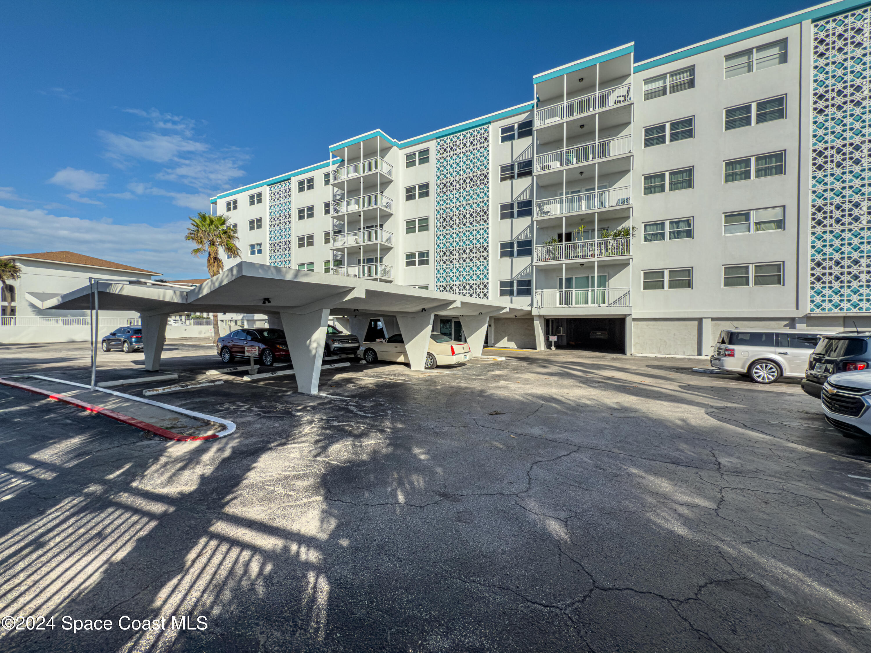 a front view of a building with street view