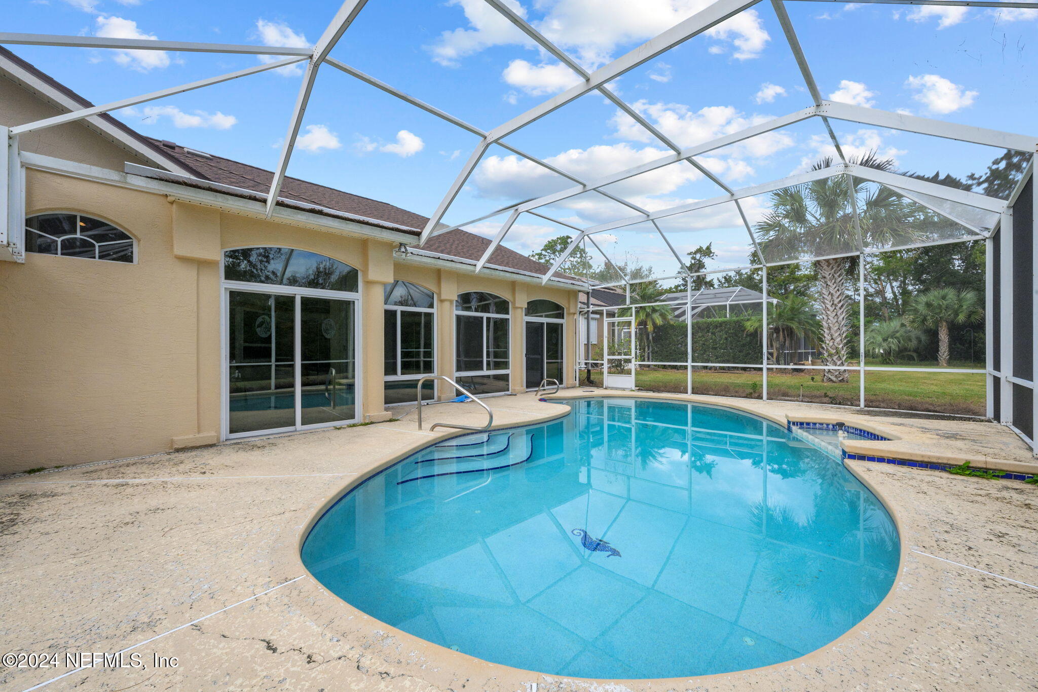 a view of a house with a swimming pool