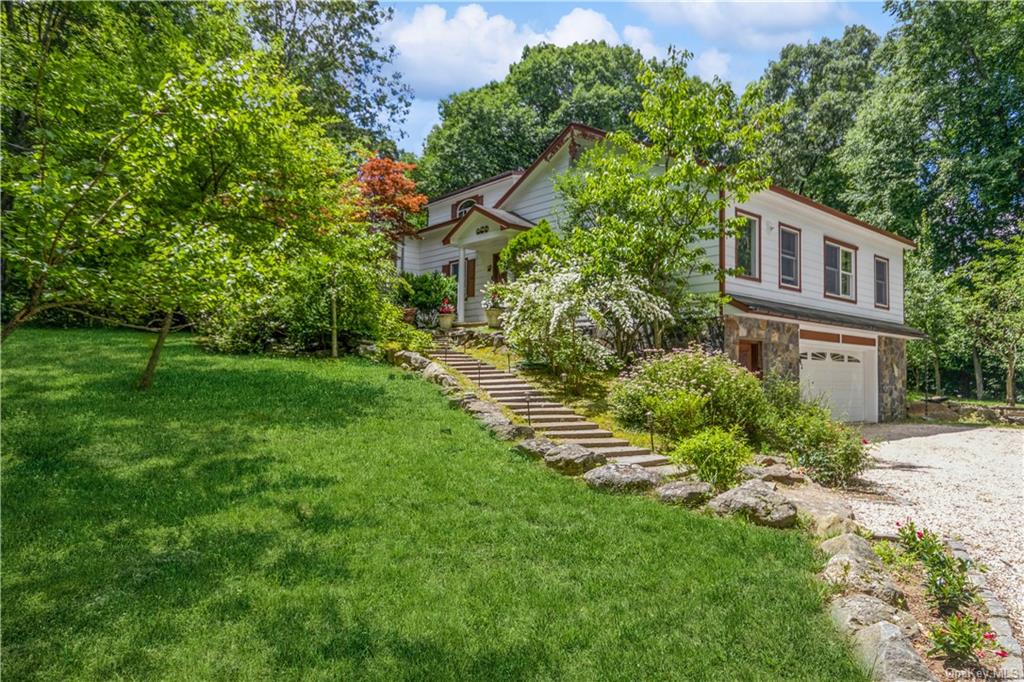 a house view with a garden space