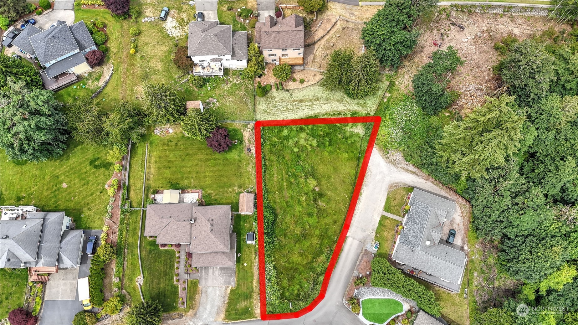 an aerial view of residential house with outdoor space and swimming pool