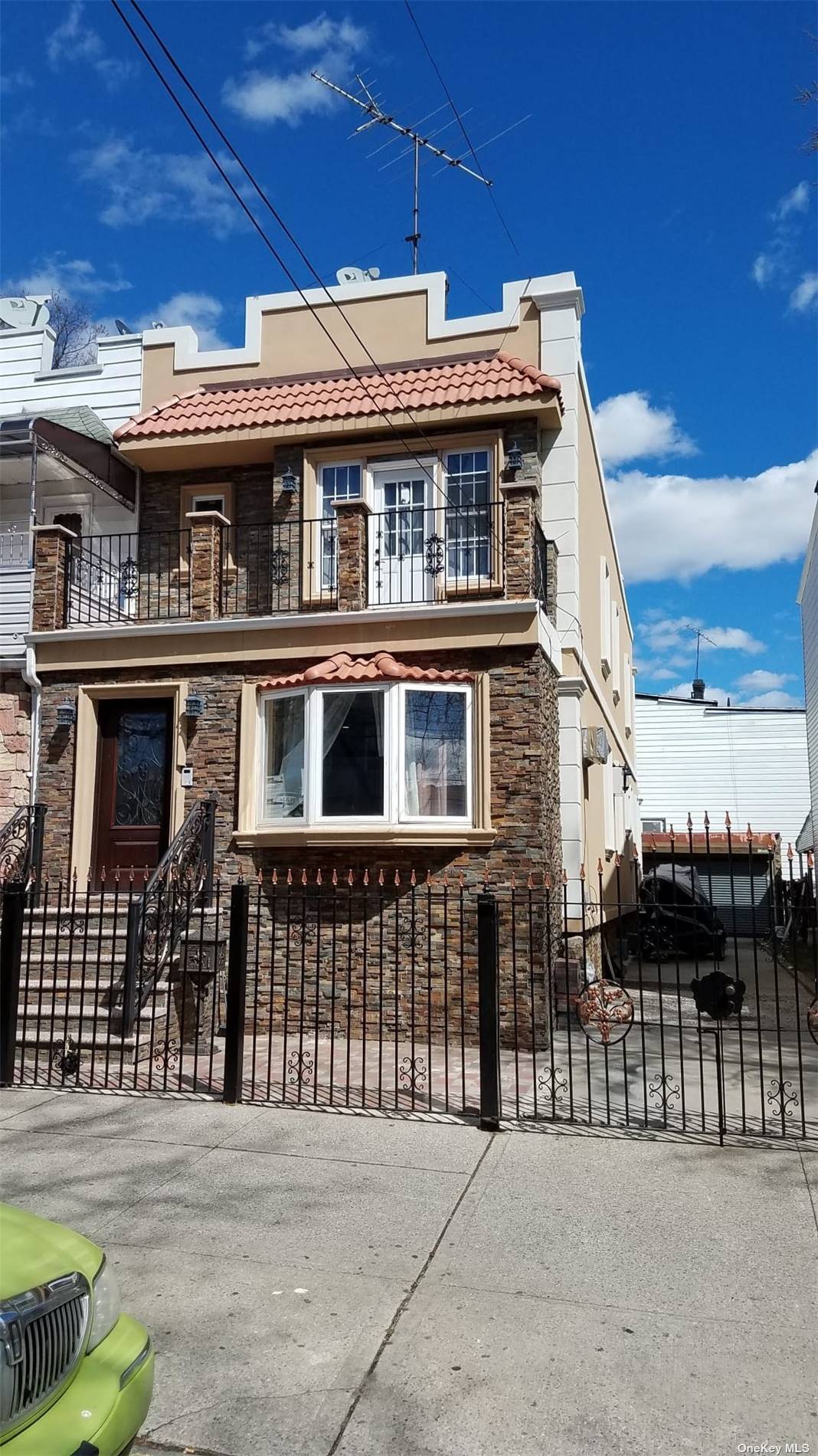 a front view of a house with glass windows