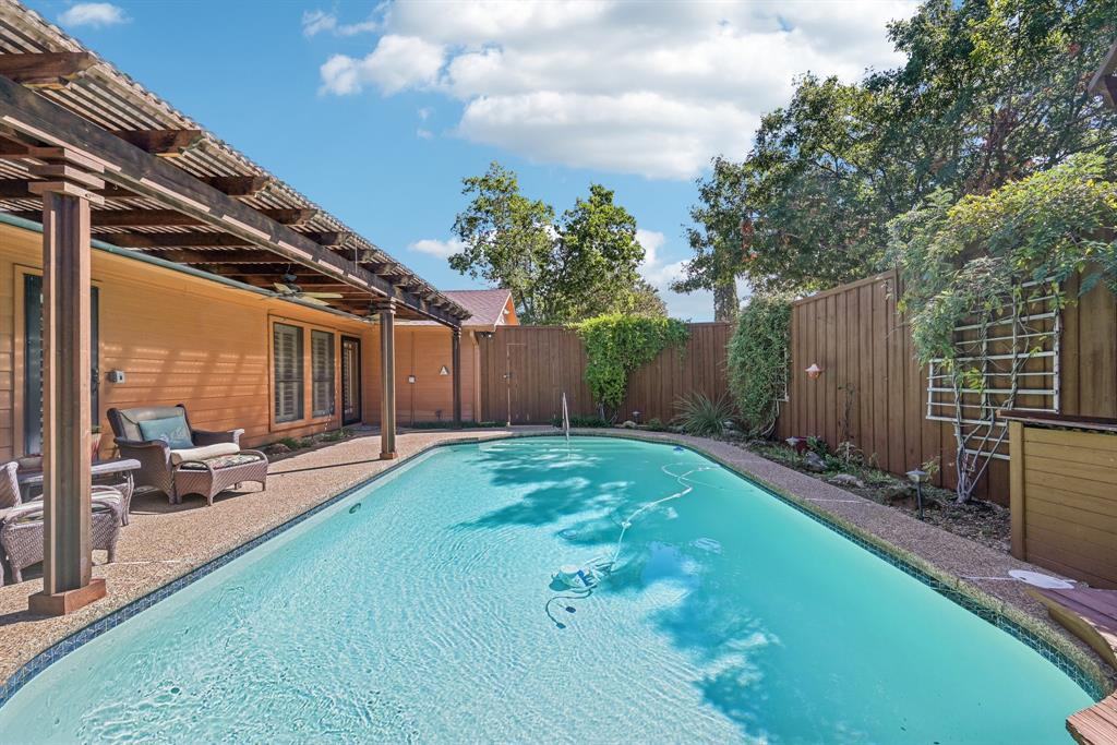 a backyard of a house with seating space