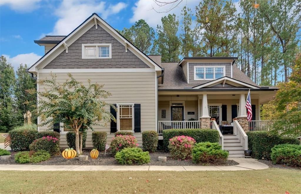 front view of a house with a yard