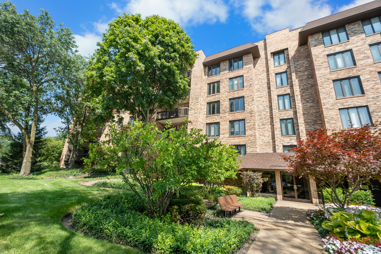 a front view of a multi story residential apartment buildings