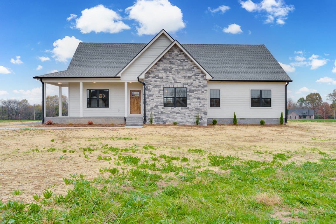 a front view of house with yard