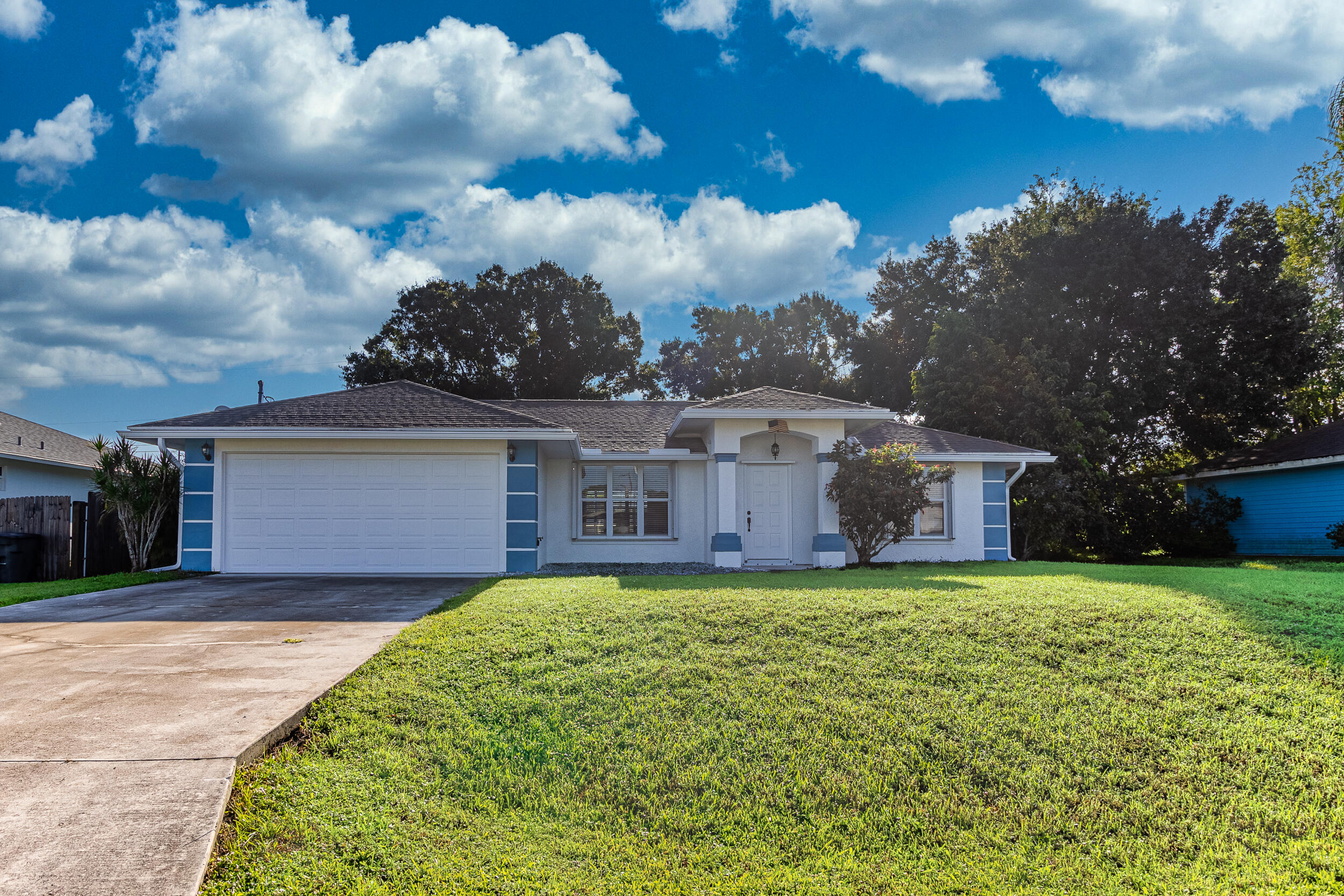 front view of a house with a yard