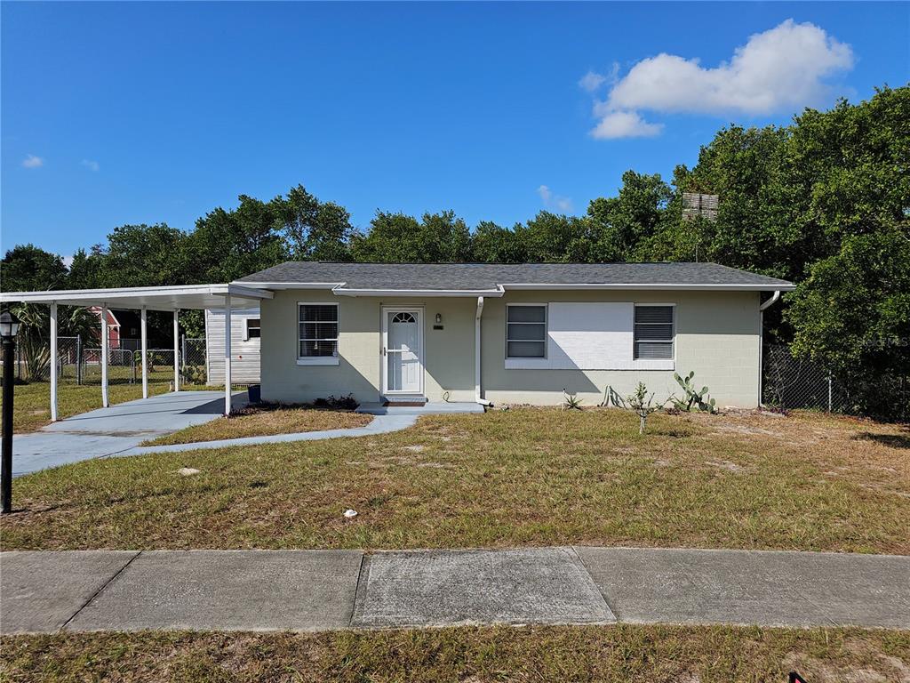 front view of a house with a yard