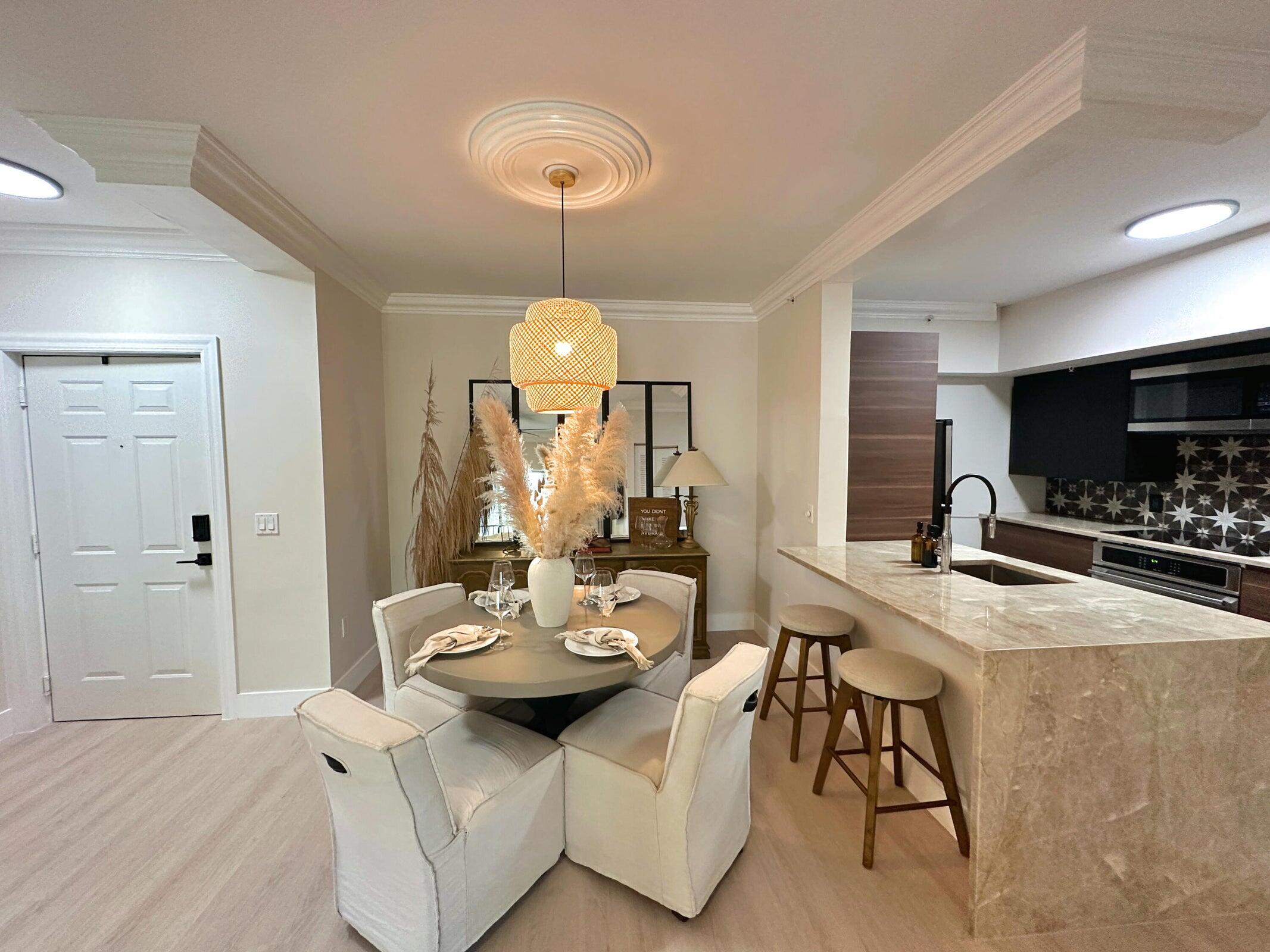 a view of a dining room with furniture