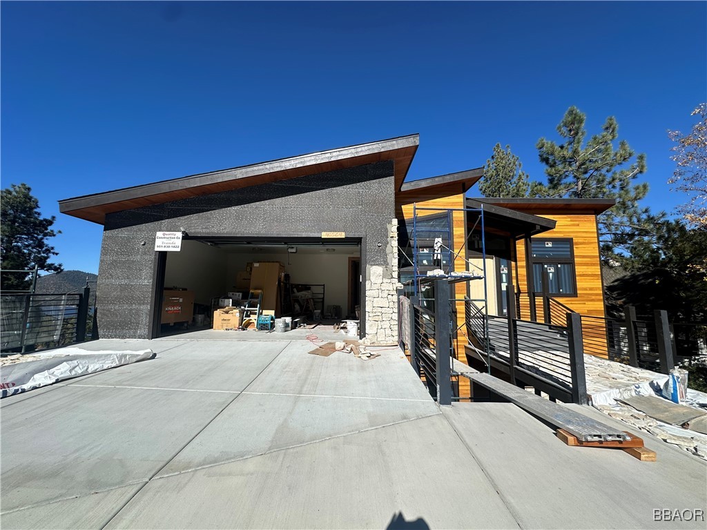 a view of a house with outdoor space and porch