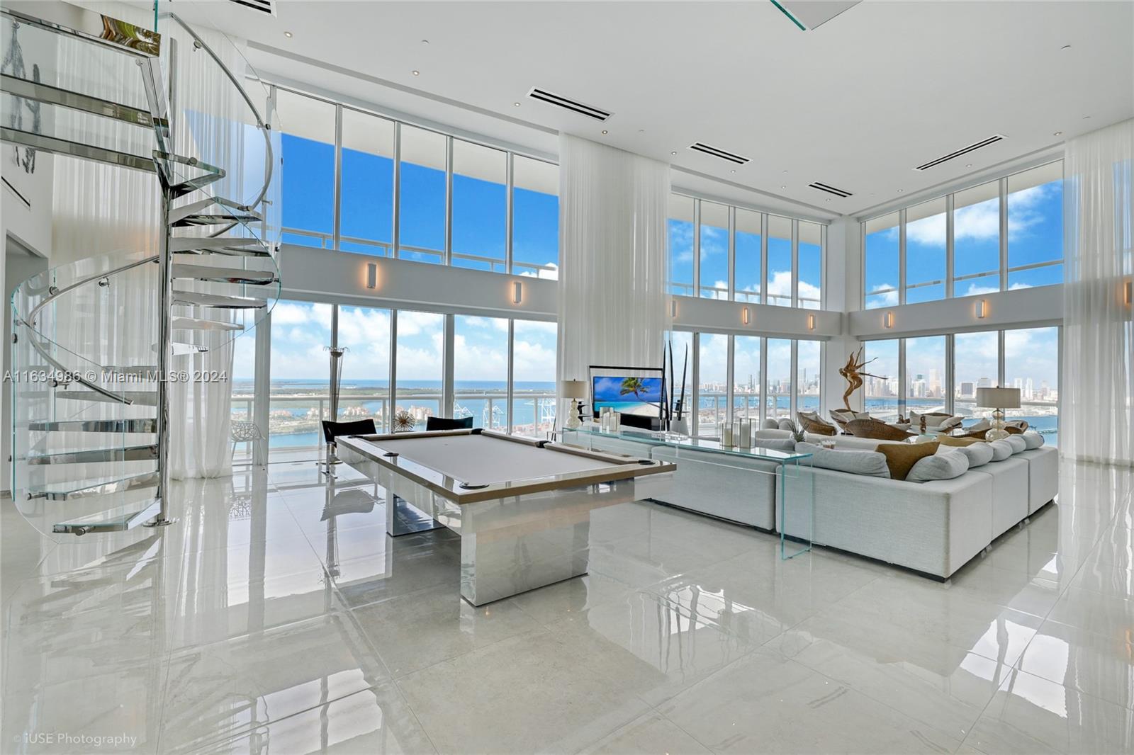 a kitchen with stainless steel appliances granite countertop a stove and a refrigerator