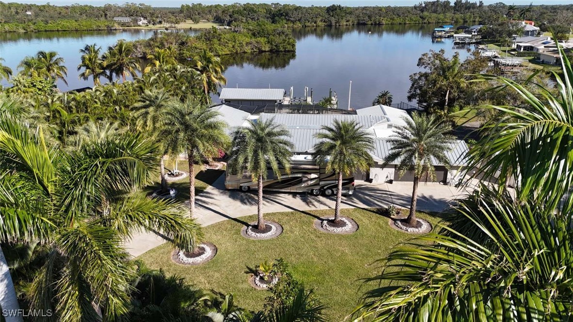 a view of a lake with a yard and lake