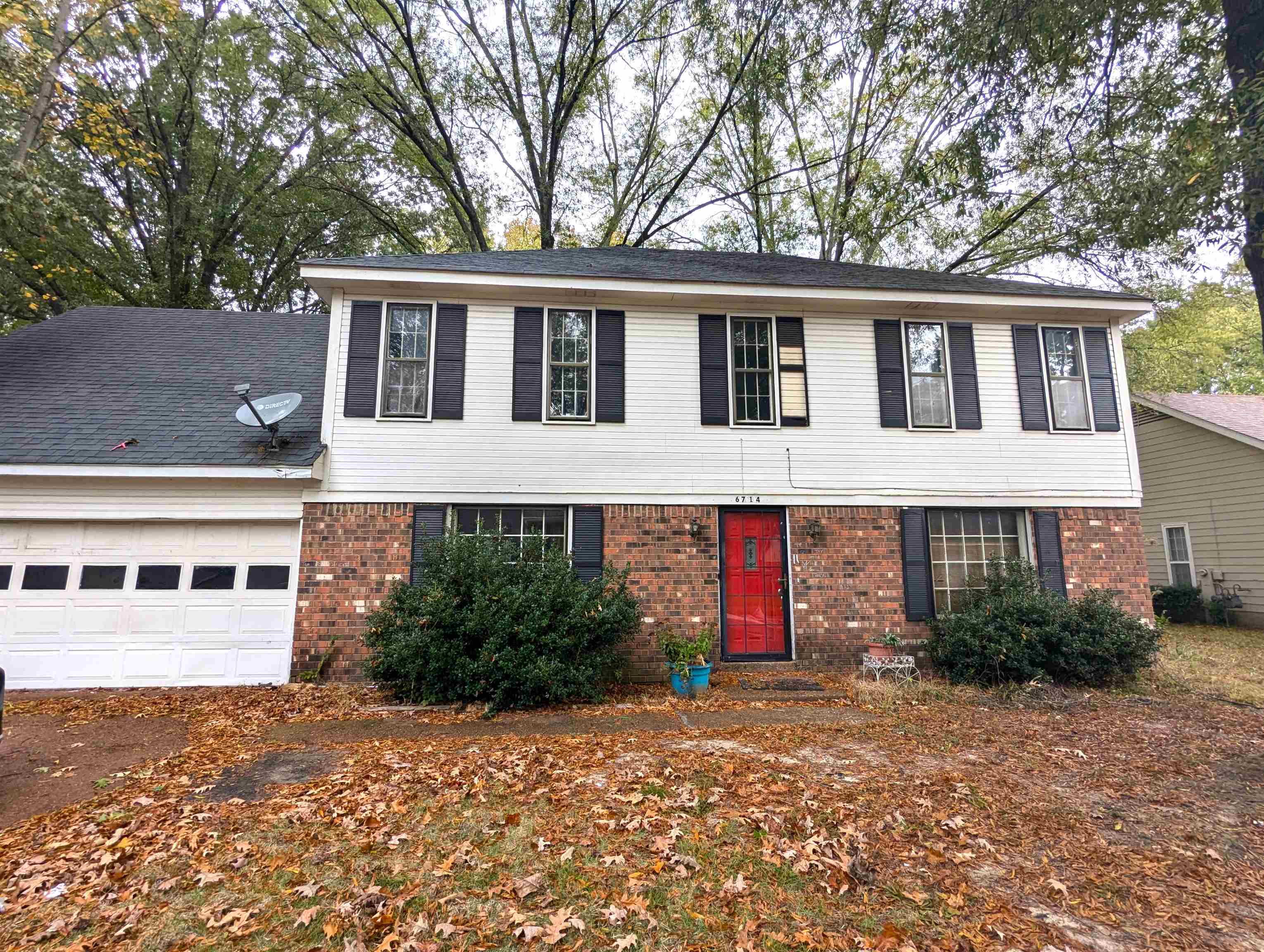 View of front of home featuring a garage