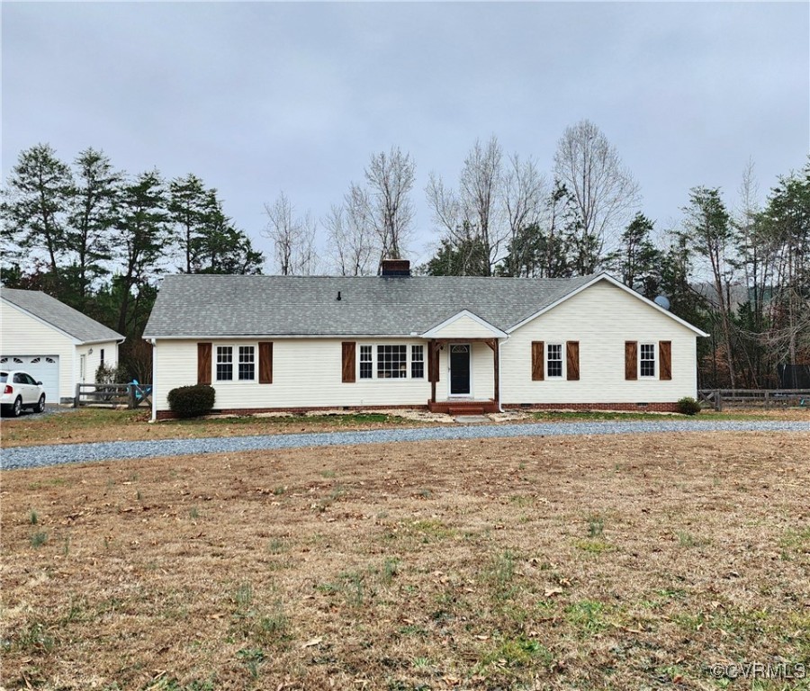 a house that is sitting in the middle of a yard