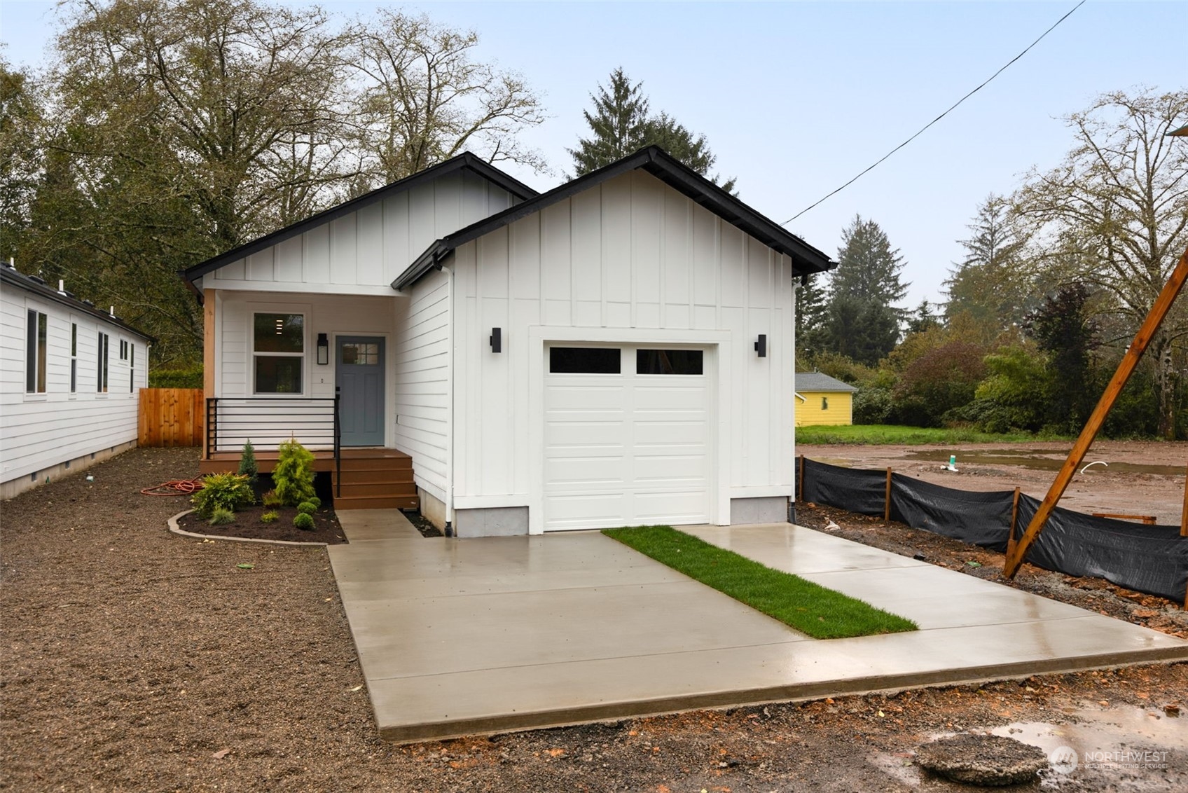 a backyard of a house with seating space