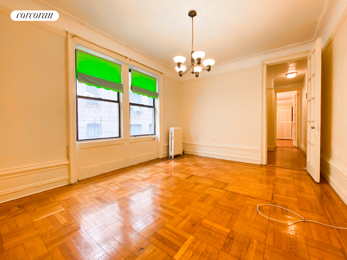 a view of an empty room with a window