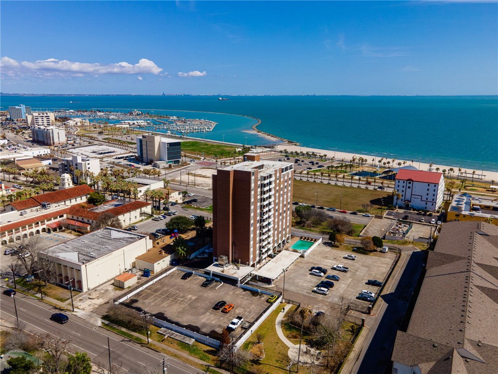 an aerial view of a house with a ocean view