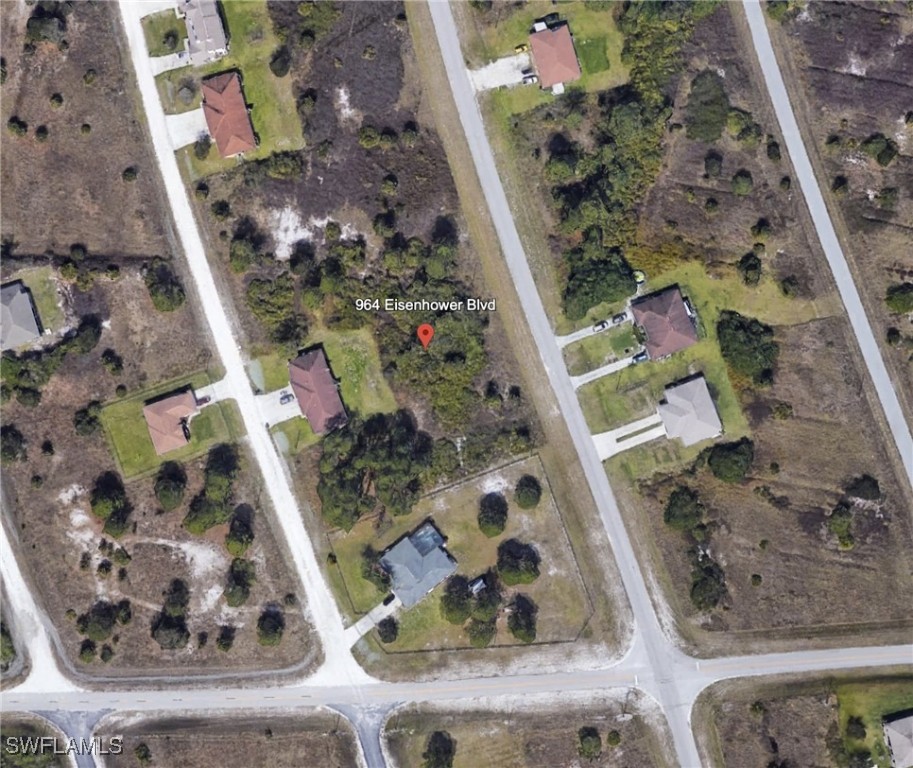 an aerial view of residential house with outdoor space