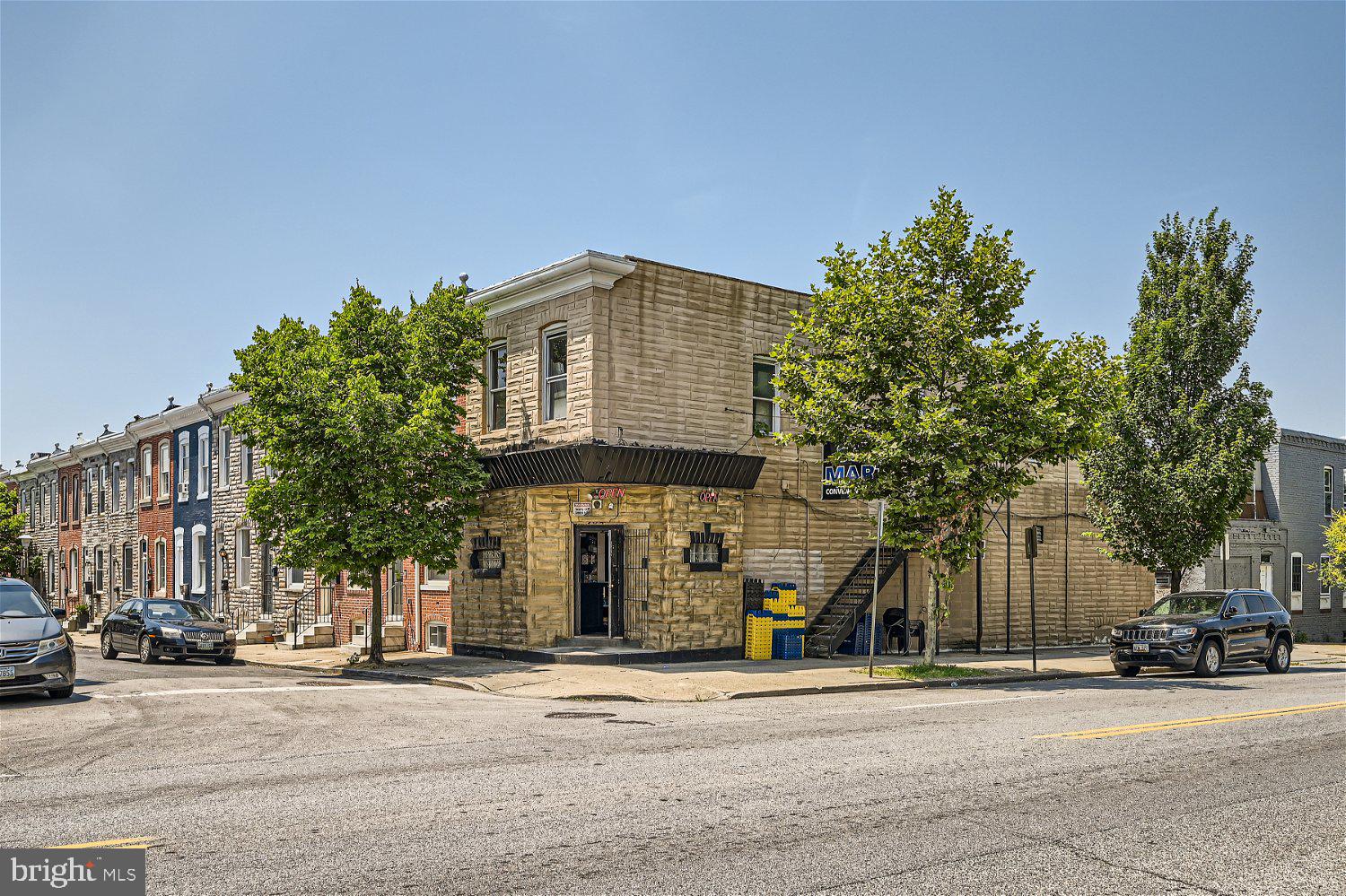 a front view of a building with street view