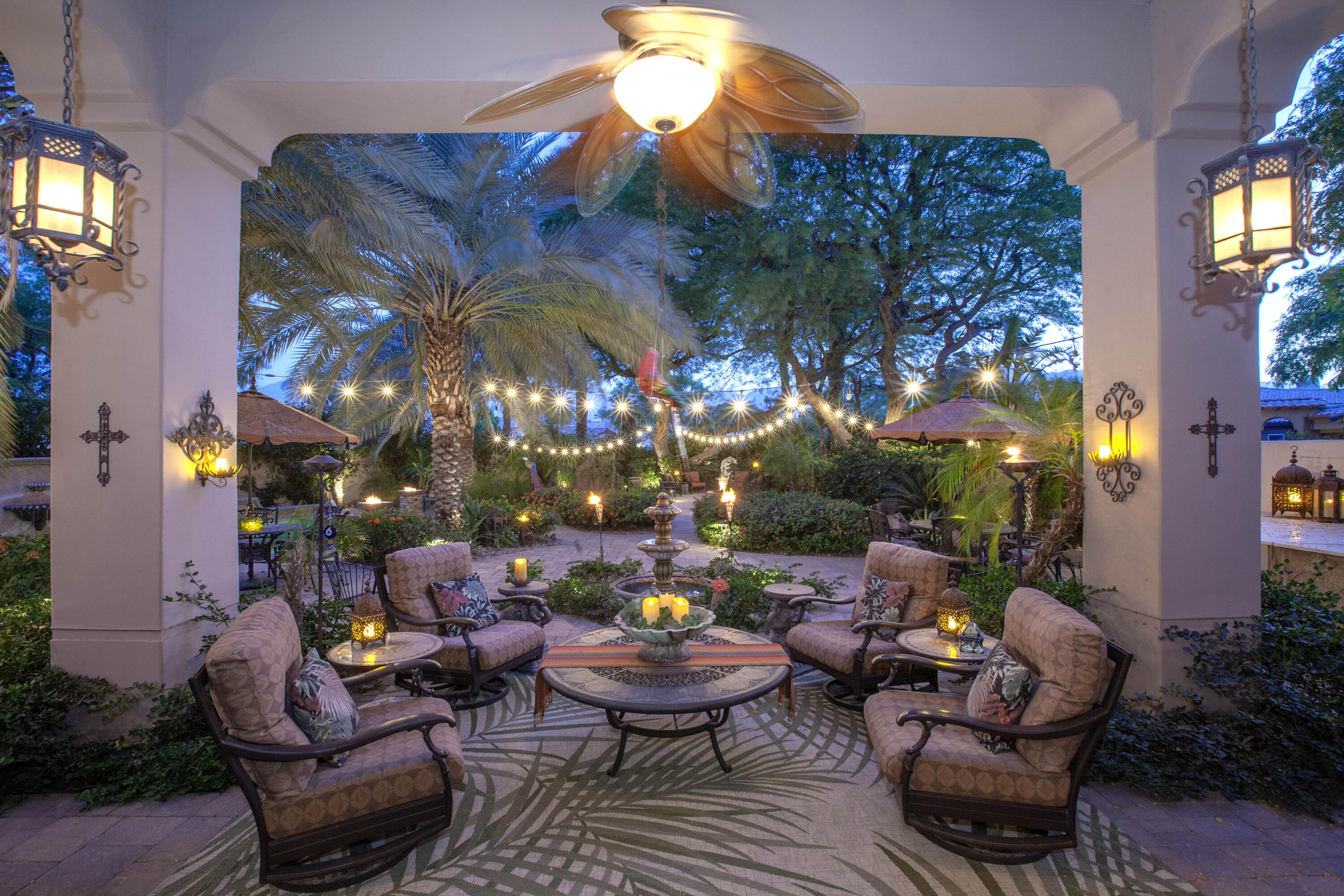 a view of a chairs and tables in the patio