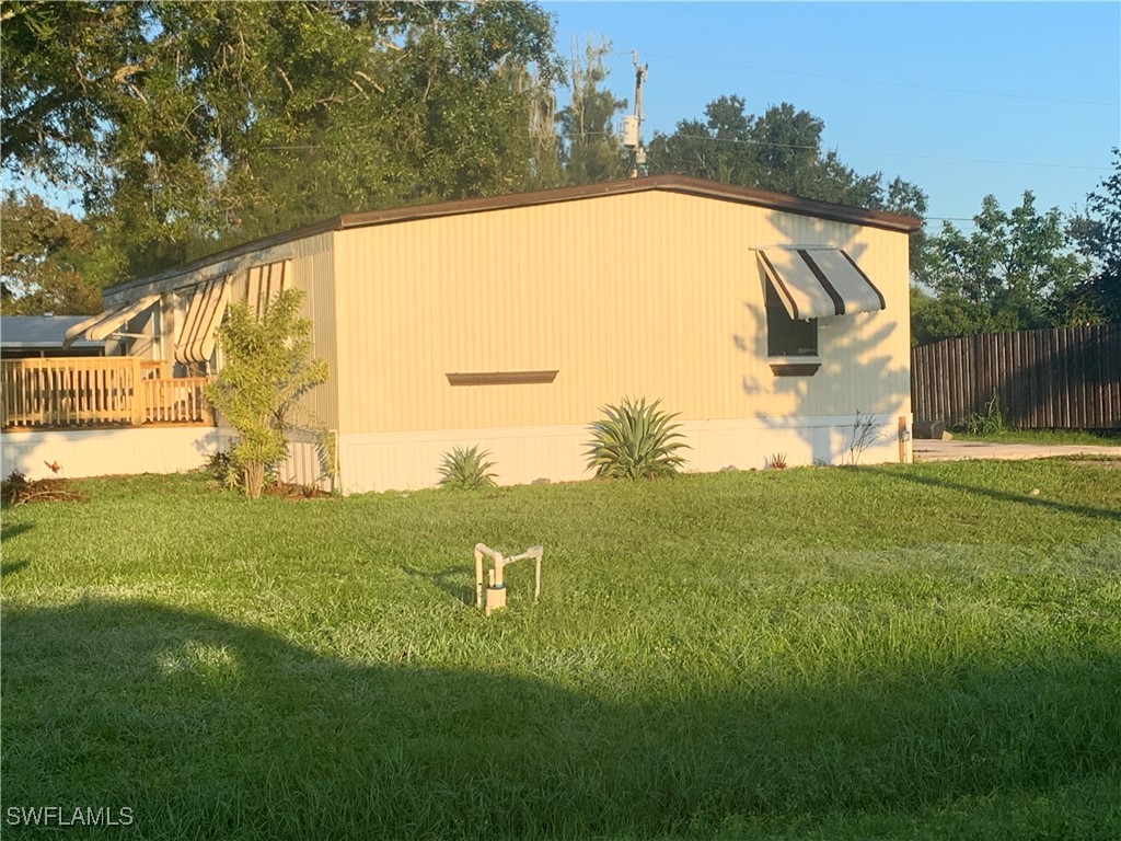 a view of swimming pool with a yard