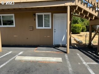 a view of backyard with cabin