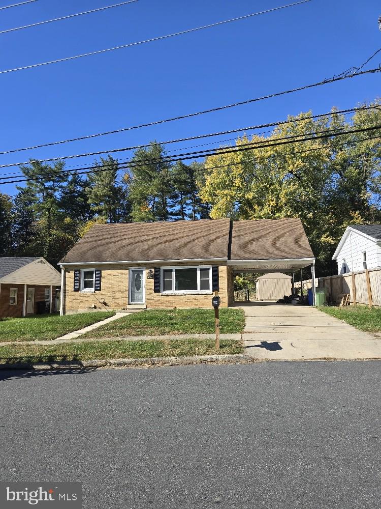 a view of house with outdoor space and street view