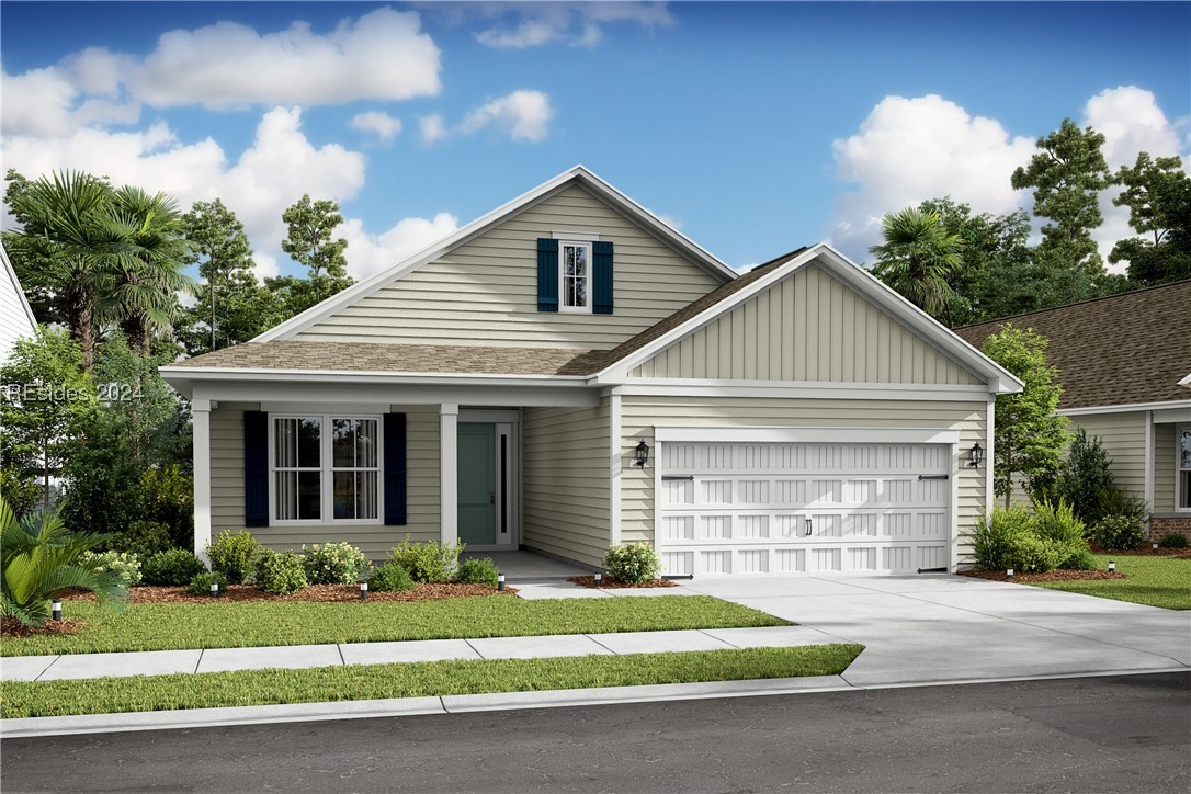 View of front of home featuring a garage