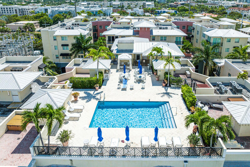 a view of a swimming pool with a patio