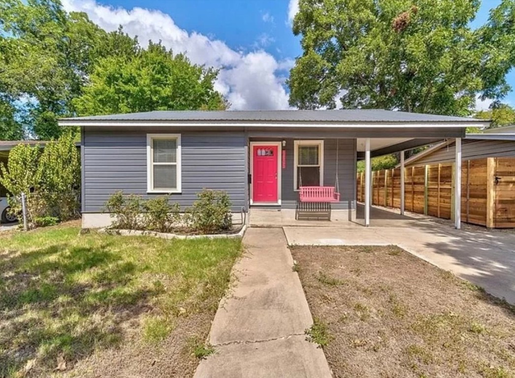 front view of a house with a yard