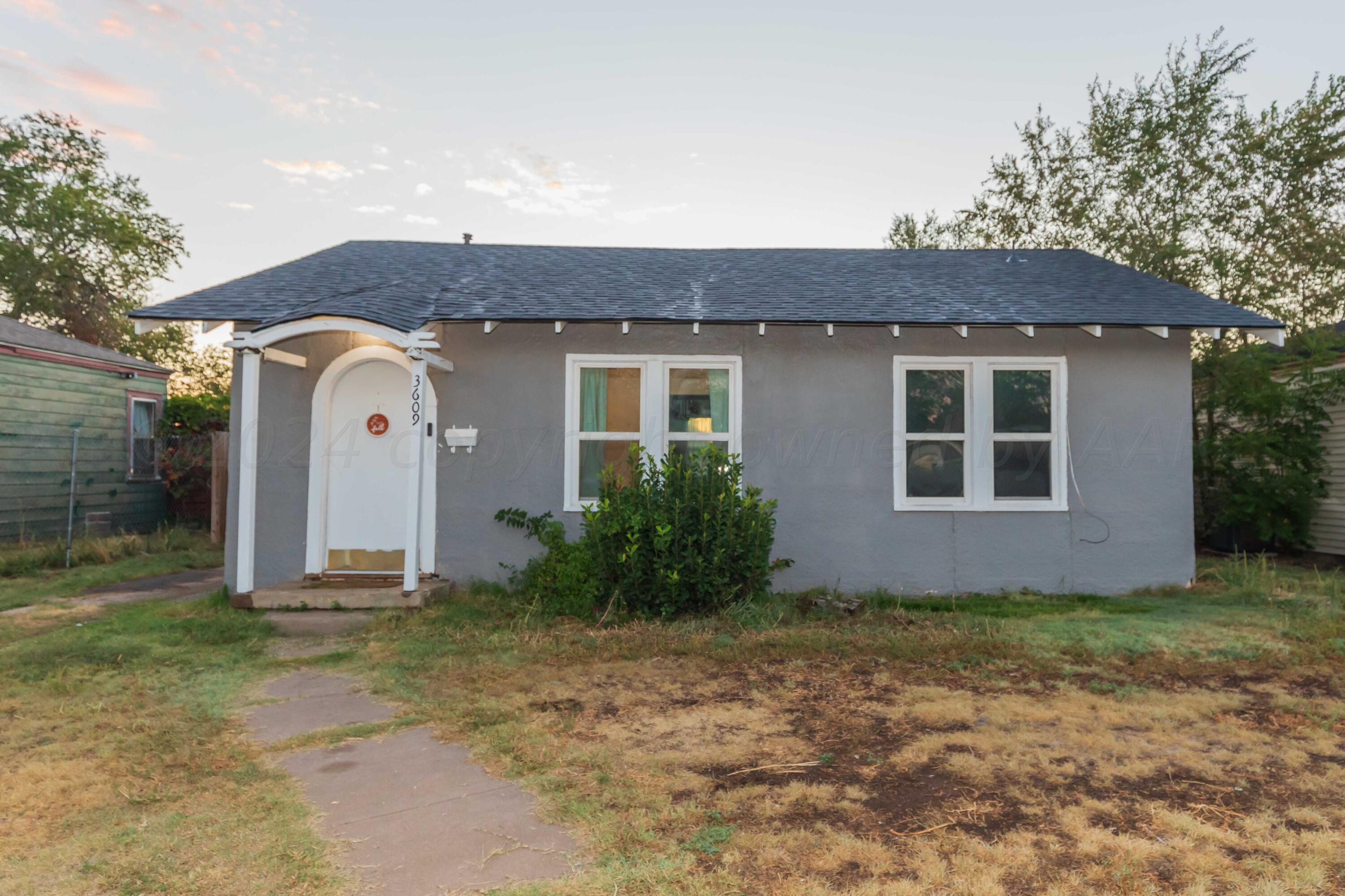 a front view of house with yard