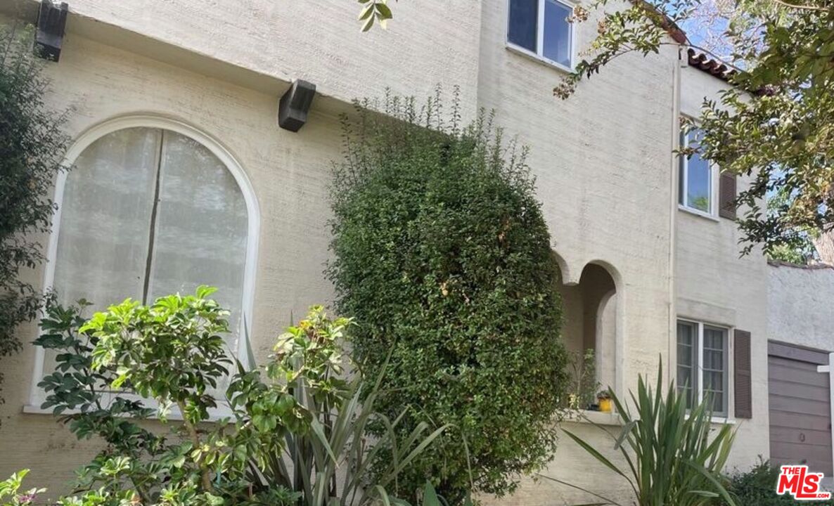 an outdoor view of garden with outdoor seating