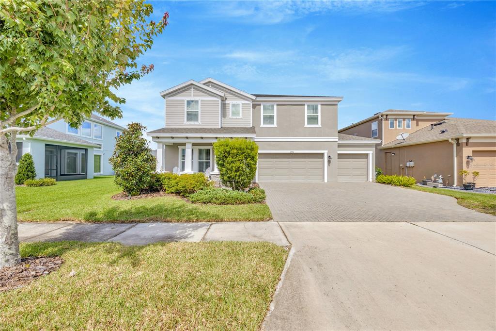 front view of a house with a yard