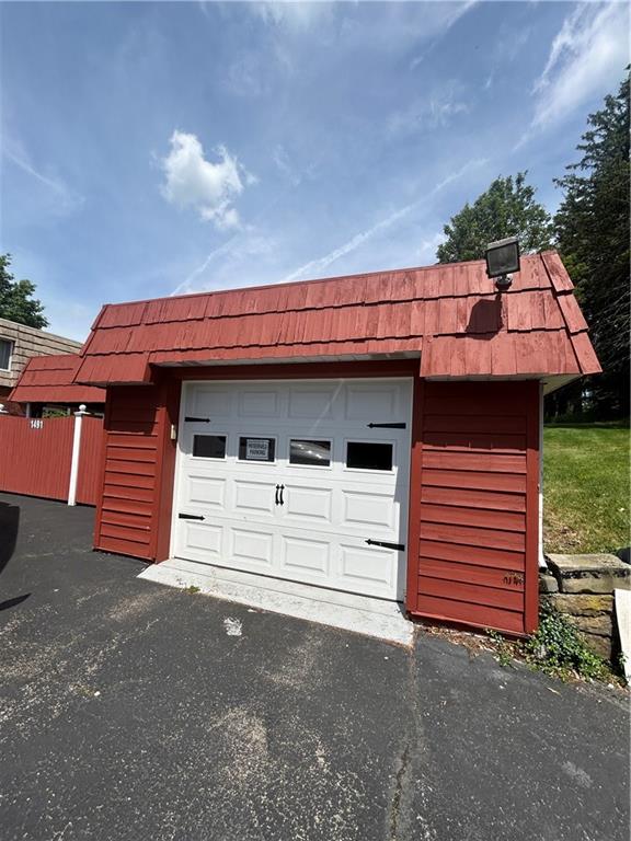 a view of a house with a garage