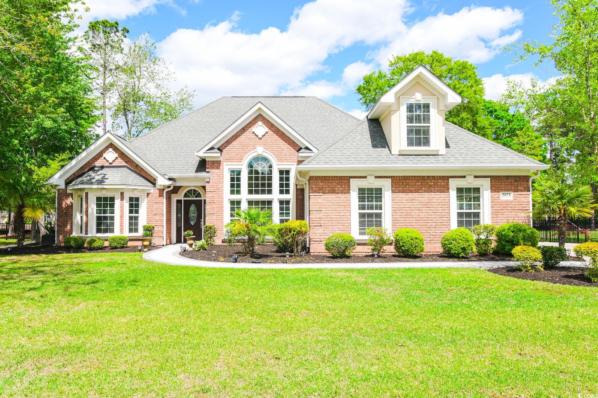 View of front of home featuring a front yard