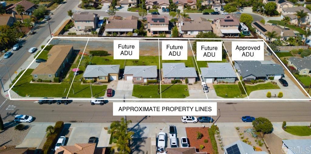 an aerial view of an buildings and street sign