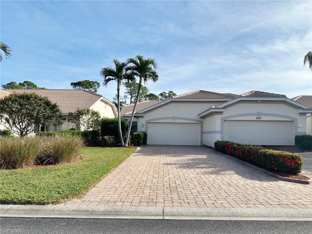 Single story home featuring a garage