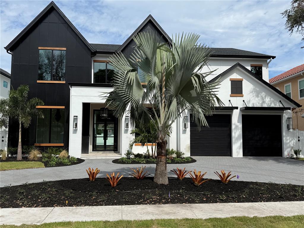 a front view of a house with entertaining space