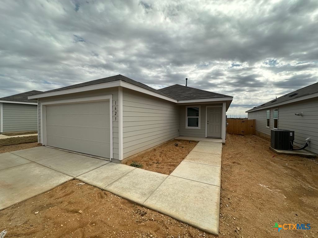 a view of backyard of house