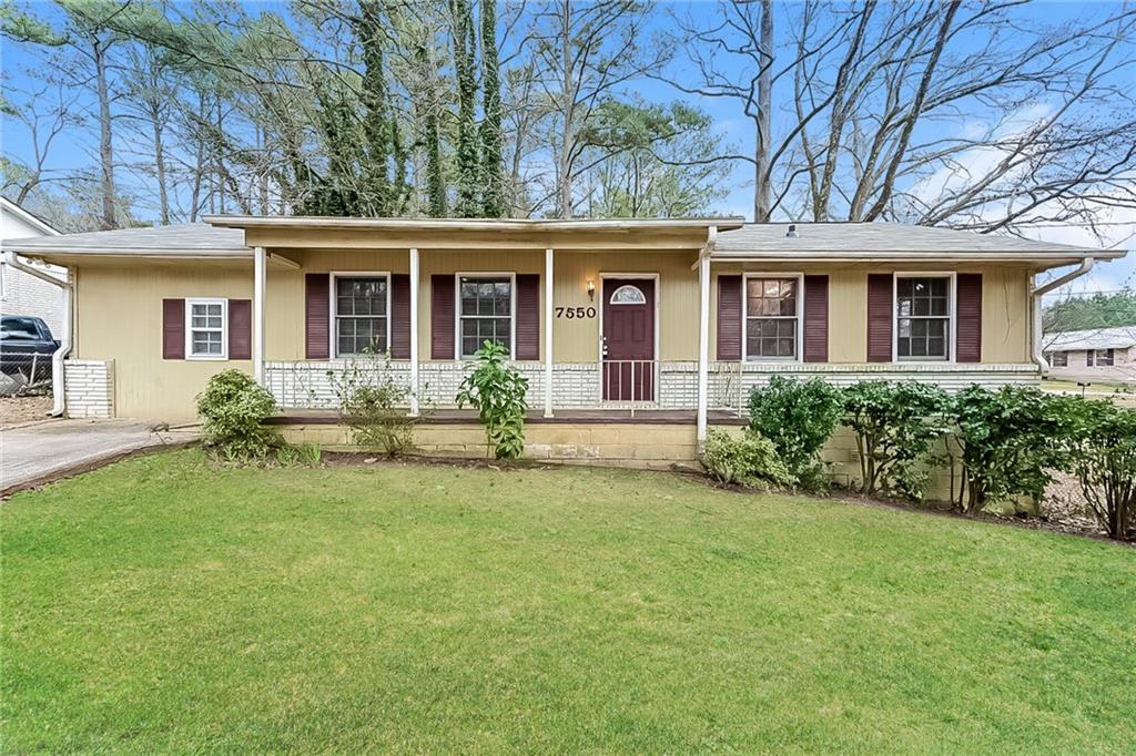 front view of a house with a yard