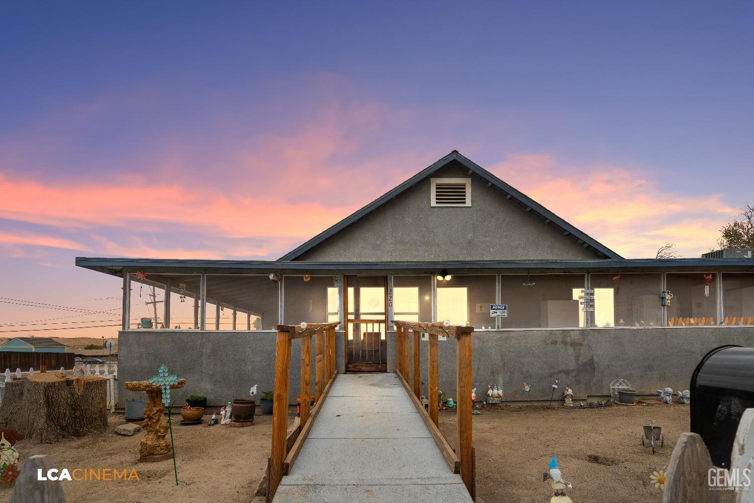 a front view of a house with yard