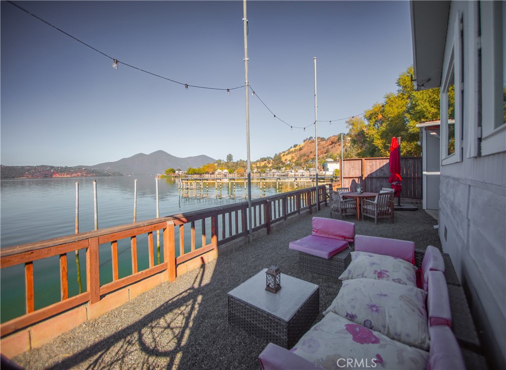 a view of balcony with furniture