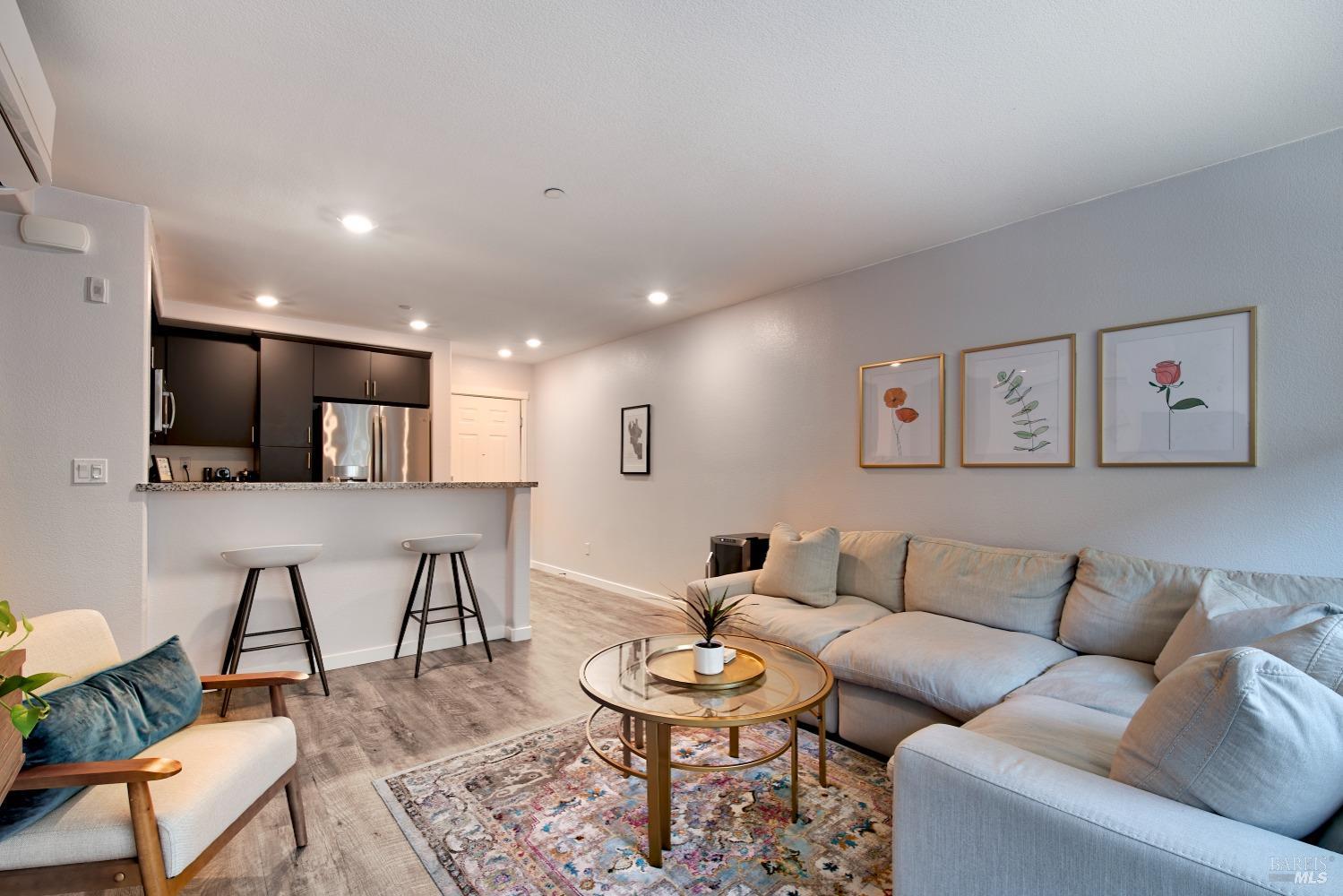 a living room with furniture and a table