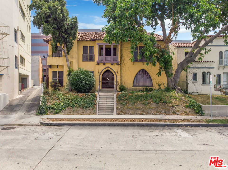 front view of a house with a street