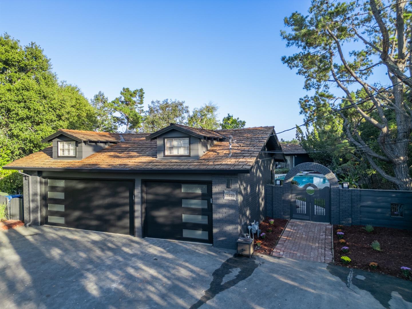 a view of a house with a garage