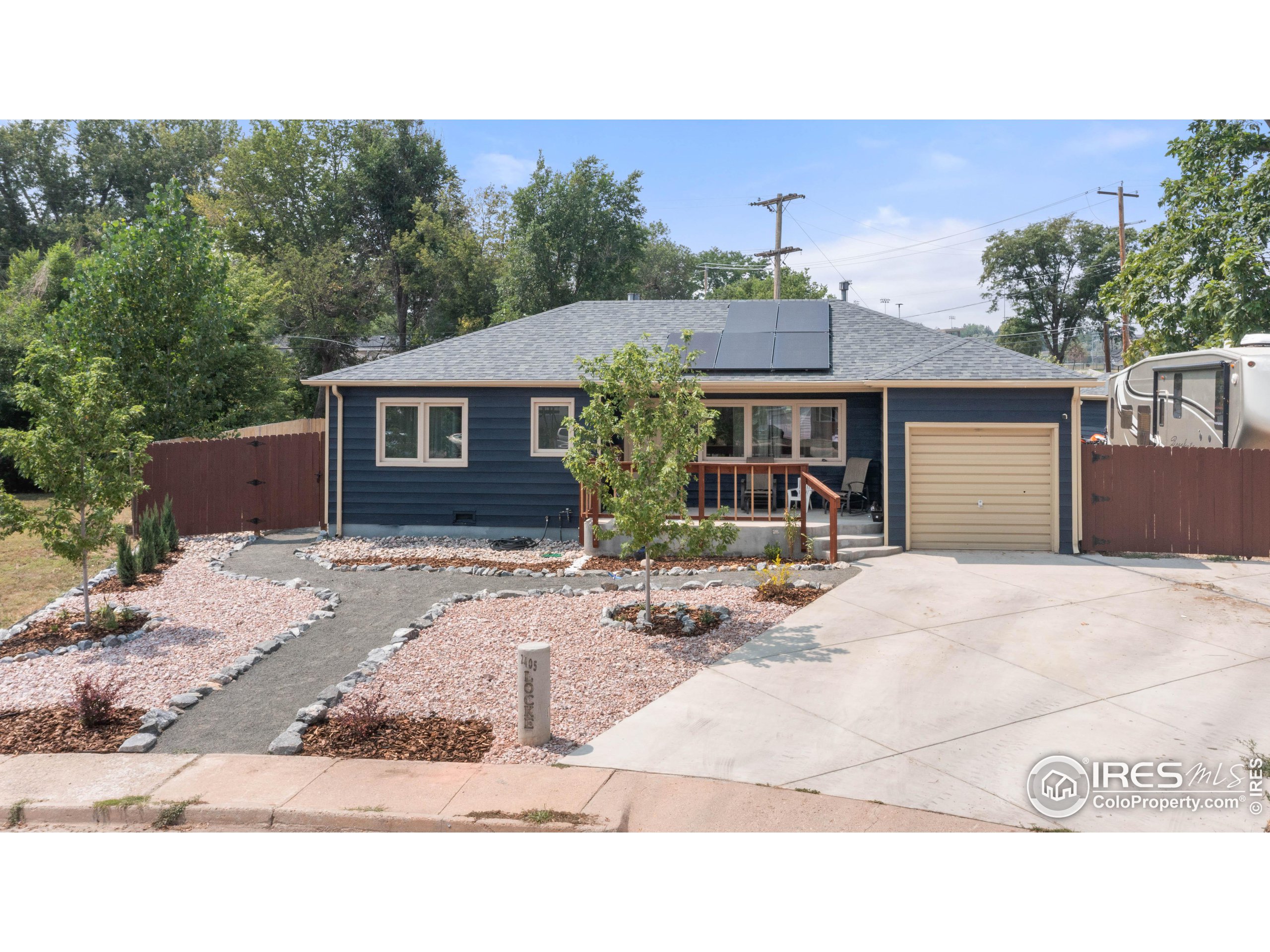 a view of house with yard outdoor seating and entertaining space